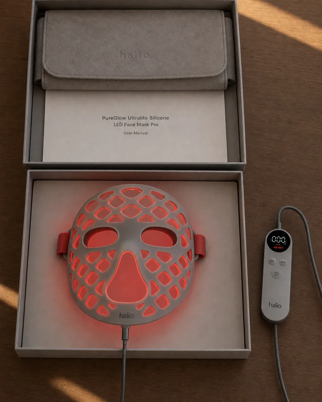 Halio PureGlow Ultralite Silicone LED Face Mask Pro, elevated open box two tier unboxing glow no copy