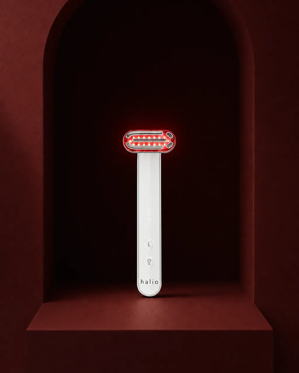 Halio Red Light Therapy Device, dark field top wordmark two line headline floati