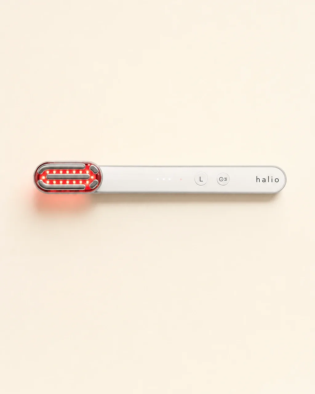 Halio Red Light Therapy Device, cream field top down flatlay centered parts no c