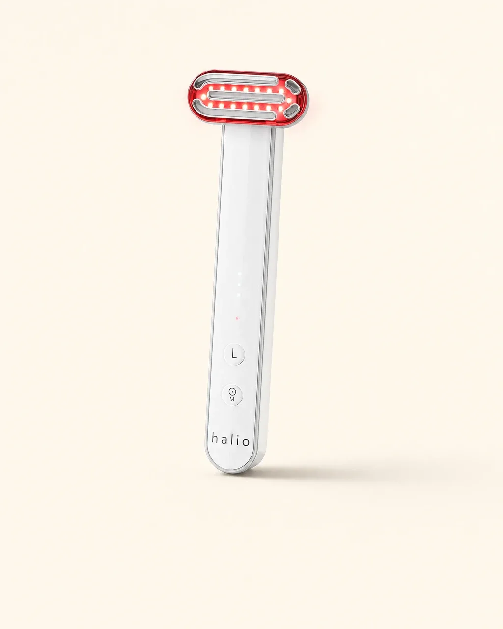 Halio Red Light Therapy Device, cream field floating showcase lit face reveal no