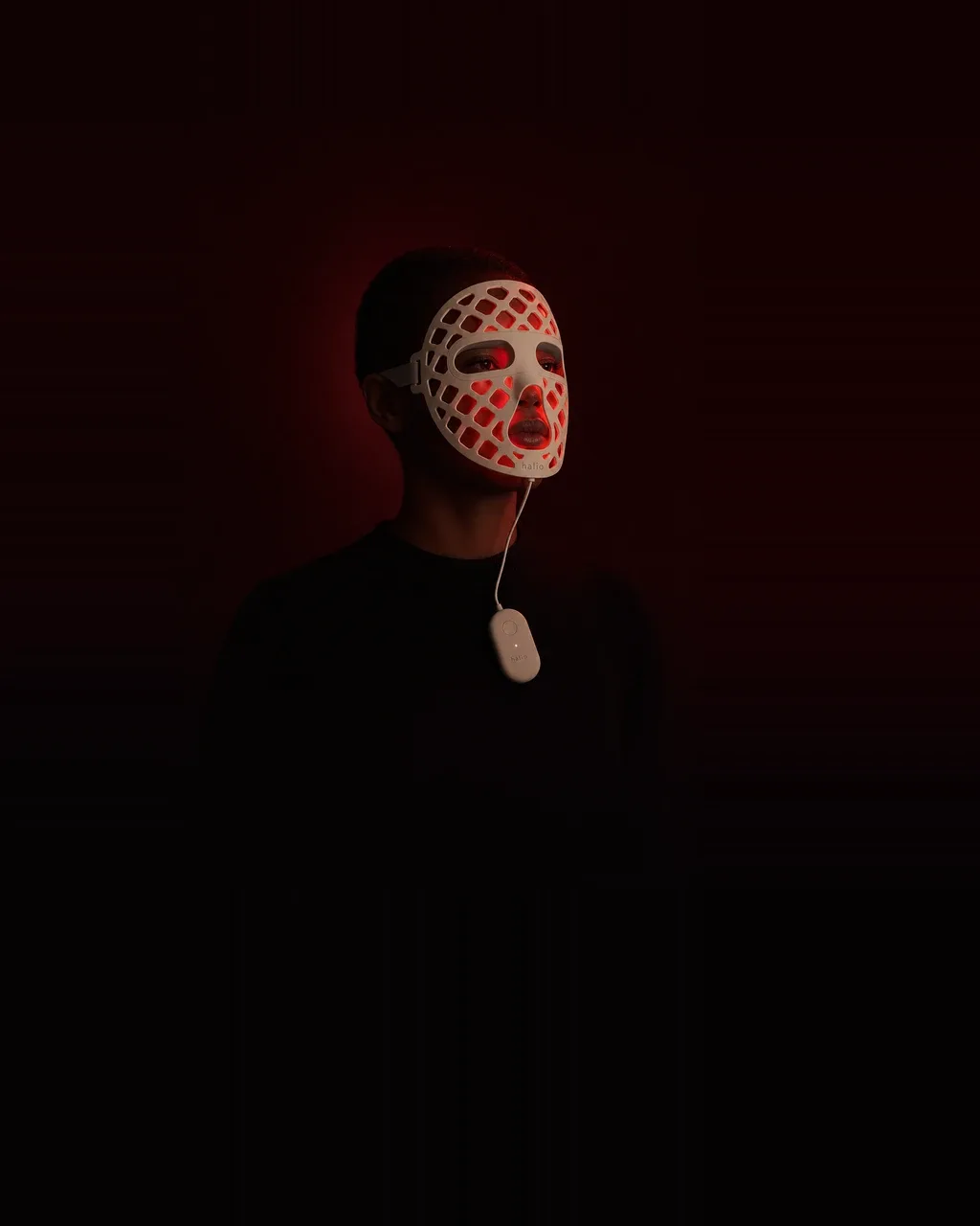 Halio PureGlow Ultralite Silicone LED Face Mask, dark field side lit worn mask three line lower t
